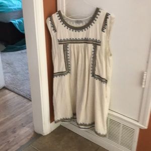 White sundress with pockets.